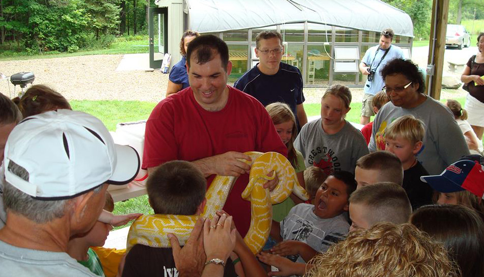 Picture of Paul Bodnar and a BIG snake